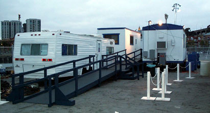 Three EPS trailers with wheelchair ramps in the EPS compound at KFOG 2001